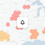 Alerts on a map — hexagonal alert regions across the U.S. by severity, with a single notification bell