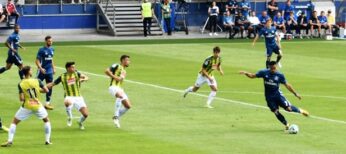 Teams playing football (soccer)